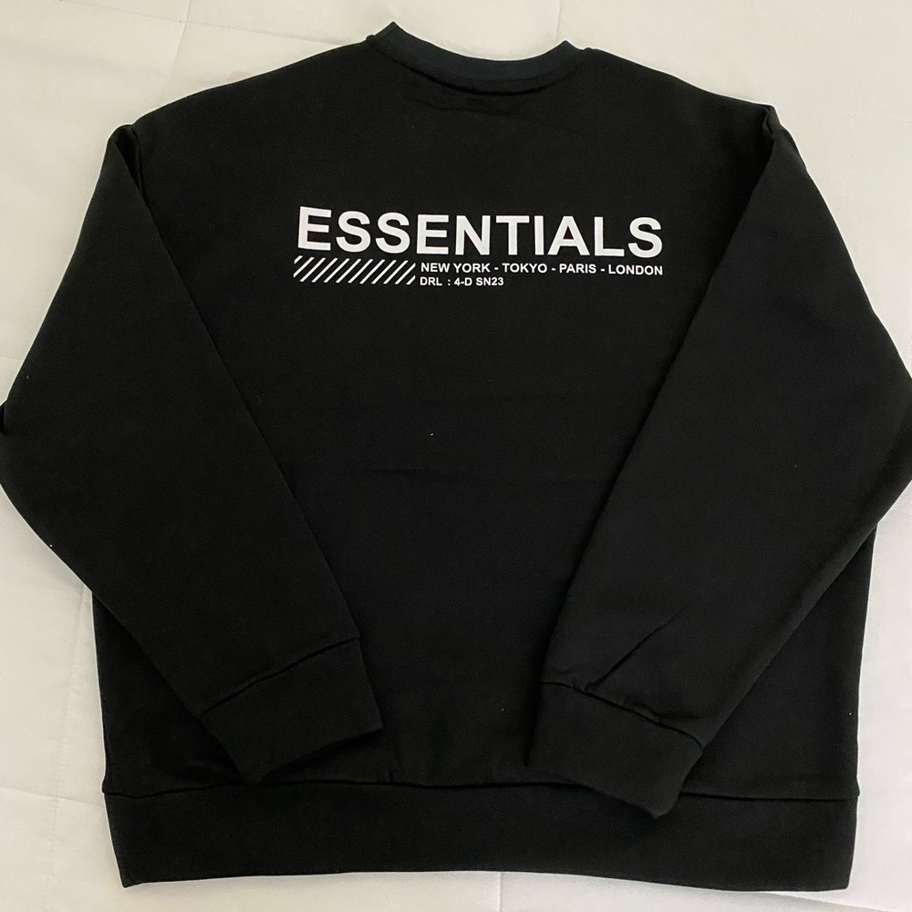 Brand new DR Essentials sweatshirt size M